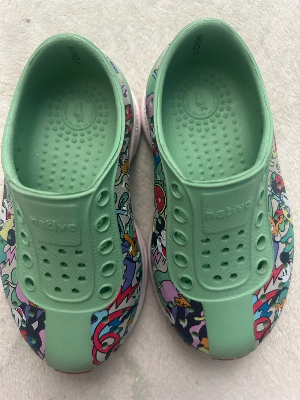 Native Disney Kids Slip-On Water Shoes in Mint Green with Multicolor Graphic